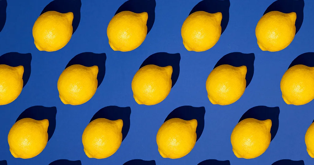 A grid of identical lemons on a blue background, each one casting the same shadow — one folder, repeated exactly, on every machine