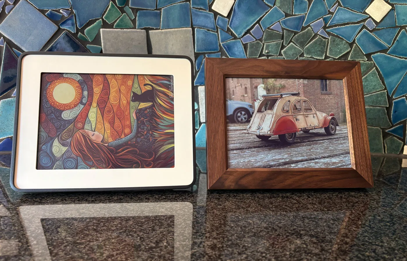 The new 10-inch Reflection Frame e-ink photo frame in black and in walnut
