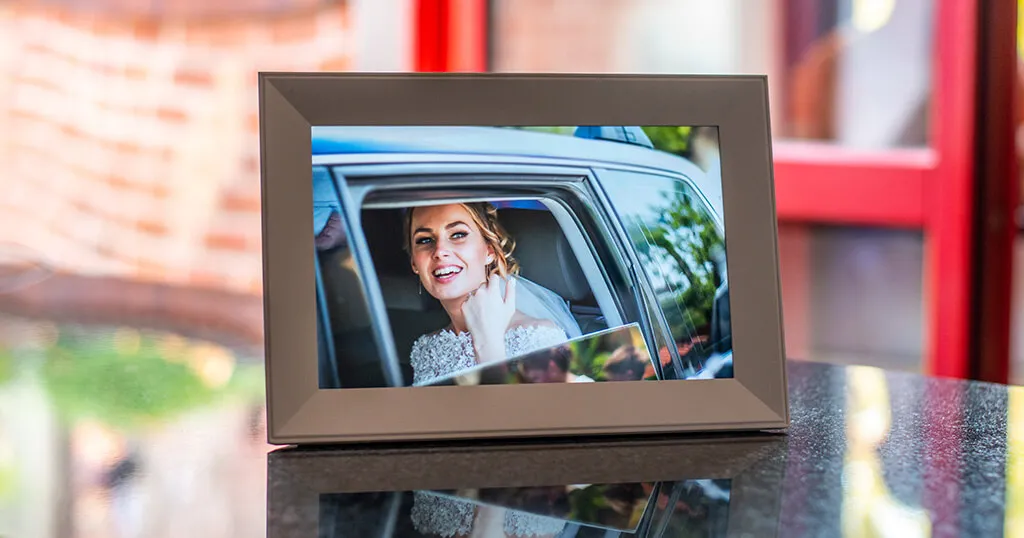 If you are looking for a digital frame for your wedding photos, you might like the beautiful white Aura Carver